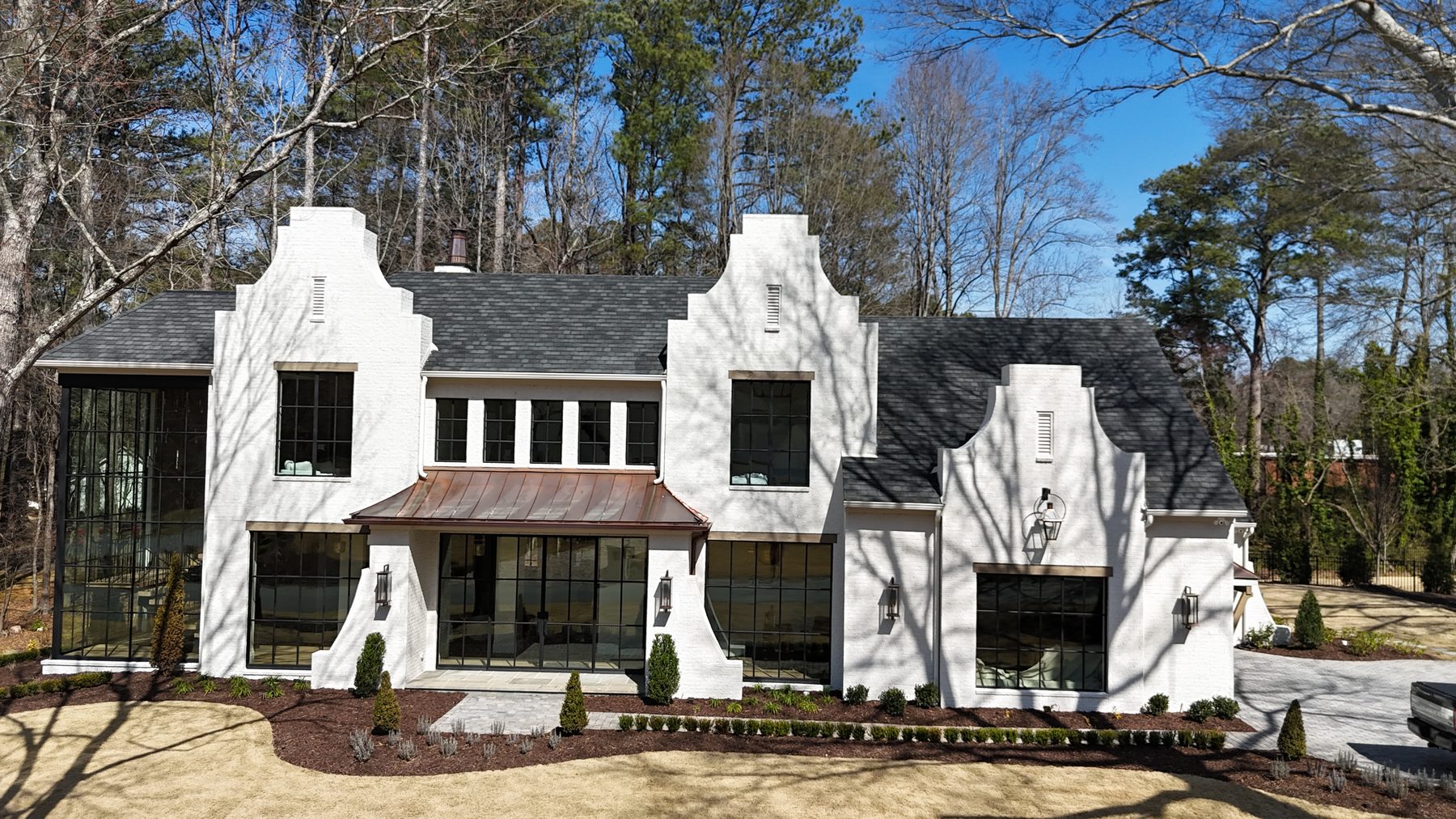 White brick gabled custom home exterior